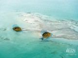 Heavenly Belize by Marius Jovaisa